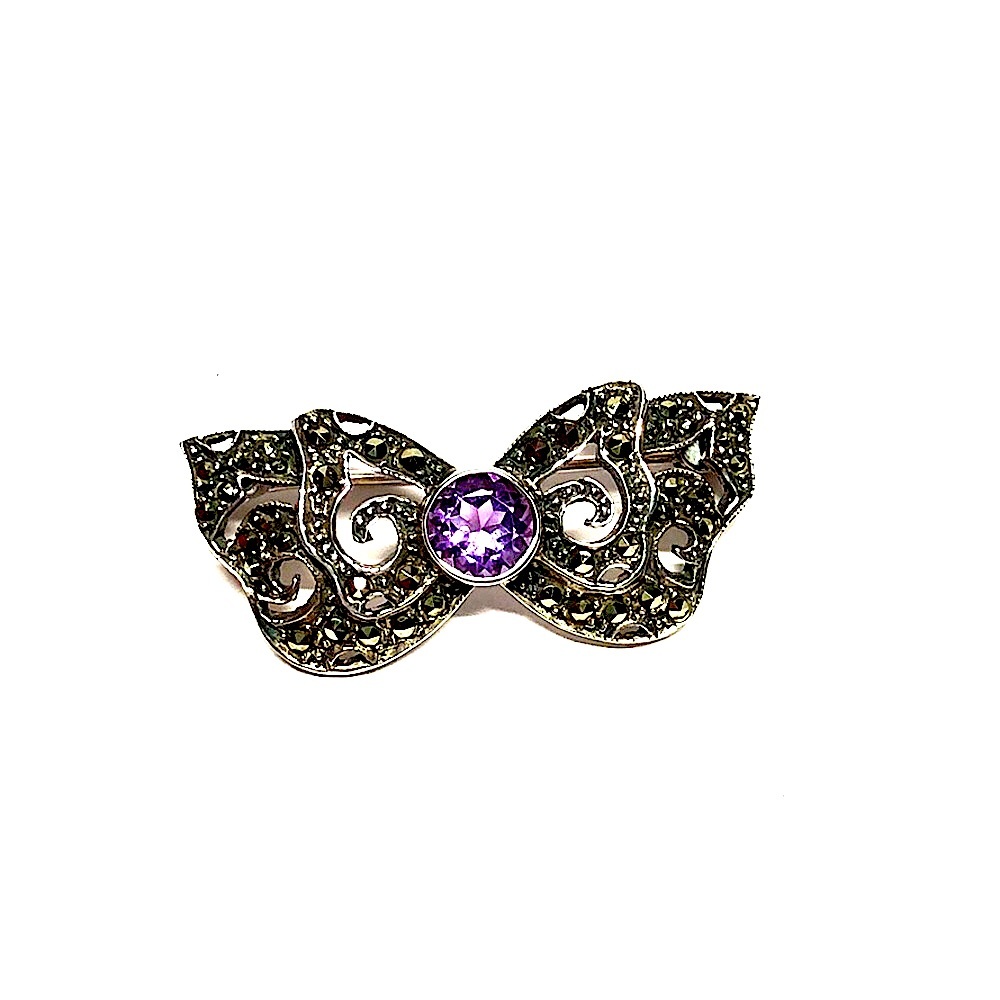 Sterling silver marcasite bow pin with amethyst